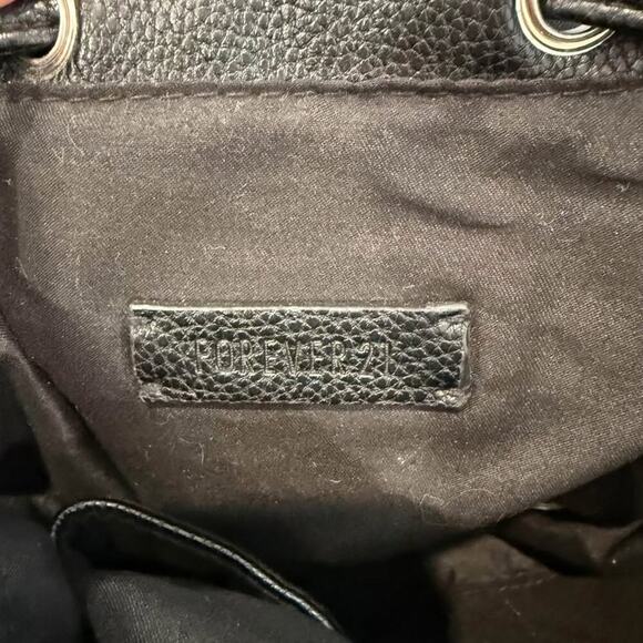 Forever 21 Black Faux Leather Drawstring Backpack Purse Tassel Adjustable Straps - Picture 4 of 9